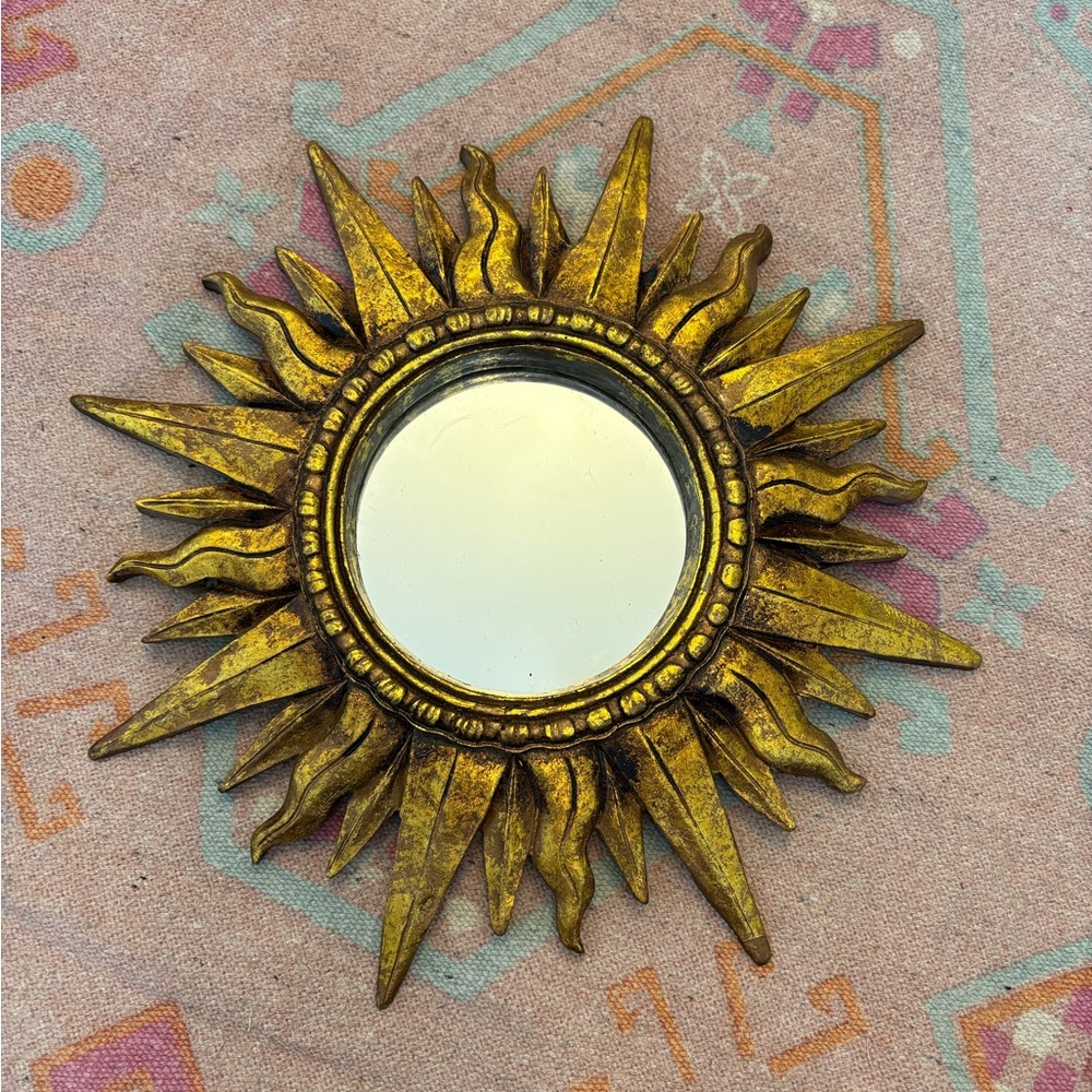 Vintage gold sun mirror